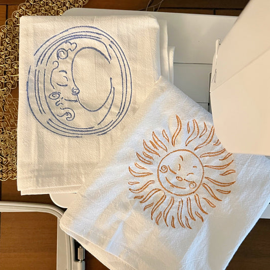 Two white celestial towels